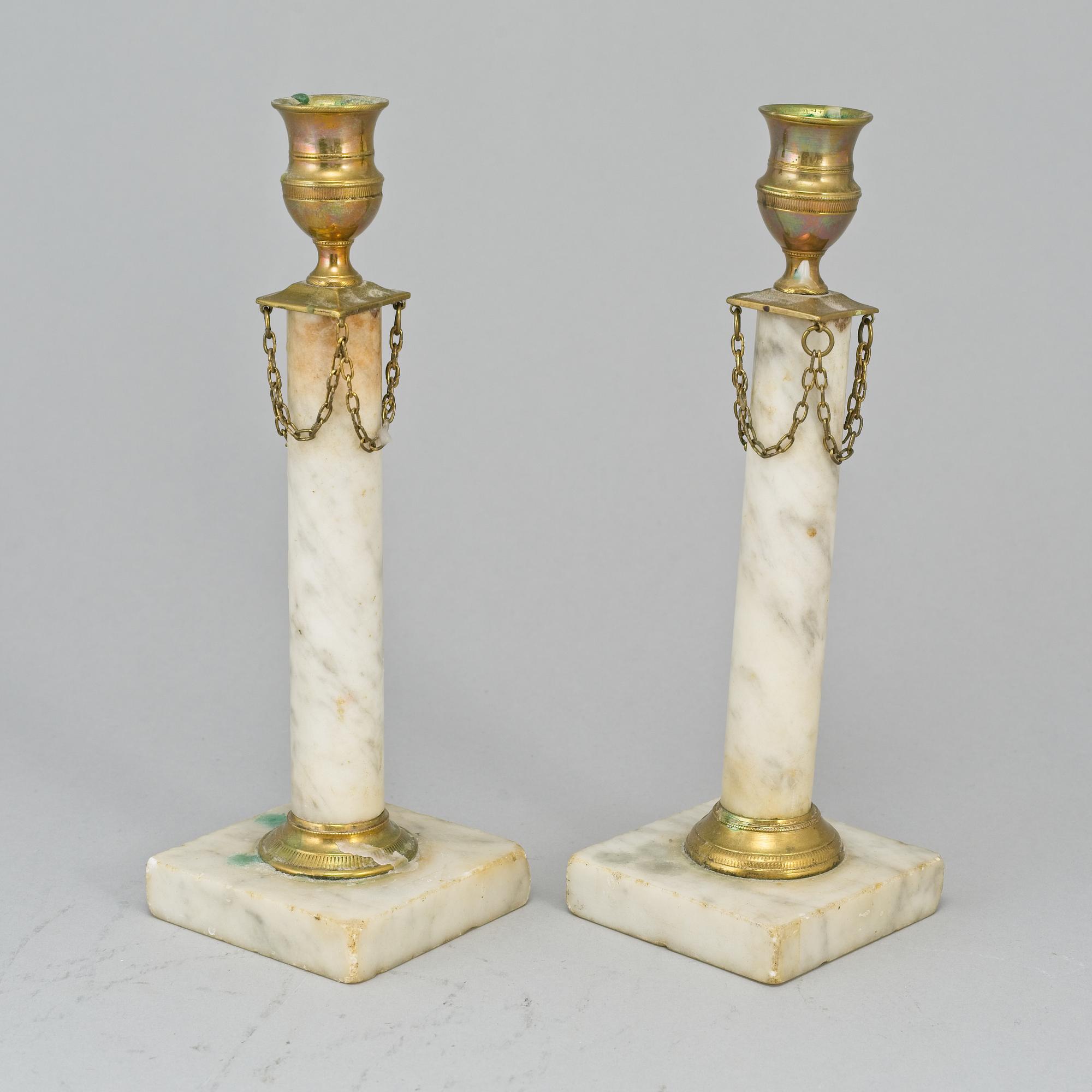 Two similar late gustavian  candlesticks, ca 1800.