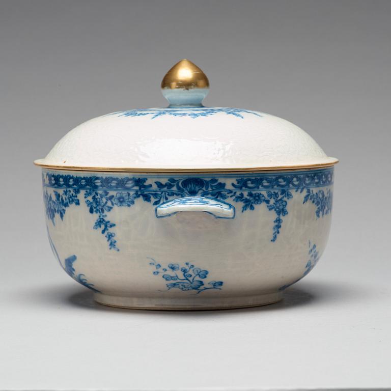 A blue and white armorial tureen with cover, and stand, Qing dynasty, 18th Century.