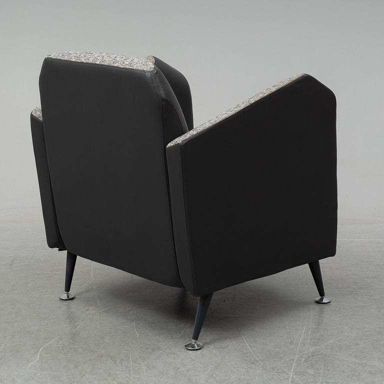 A 'Hotel 21' easy chair by Javier Mariscal for Moroso designed 1995.