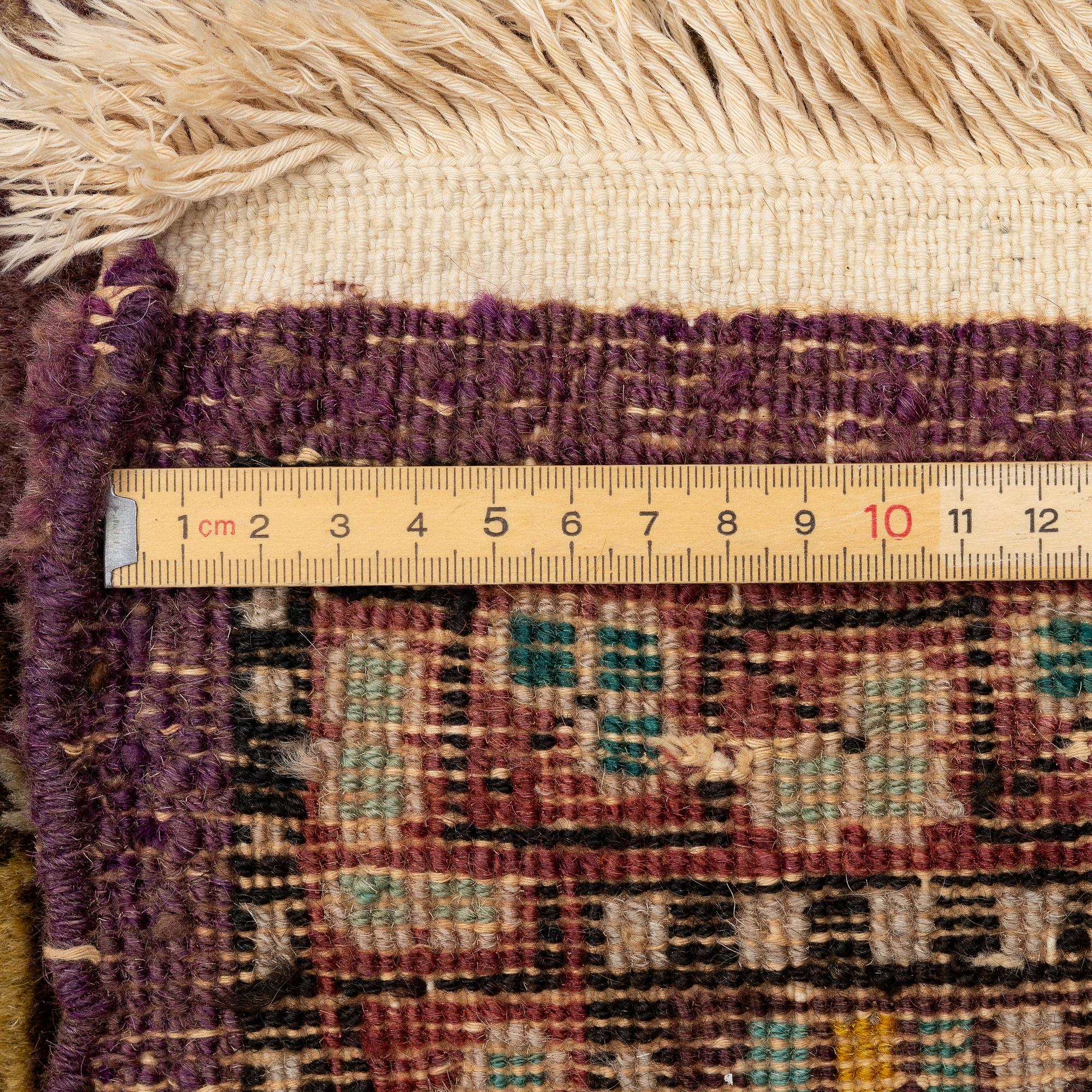 A semi-antique carpet, probably Samarkand, c. 264 x 184 cm.