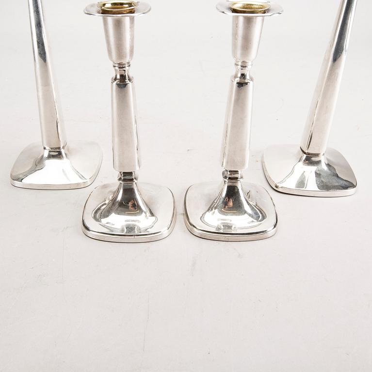 A Swedish 20th century set of two pairs of candlesticks mark of T Eldh Göteborg 1968-70.