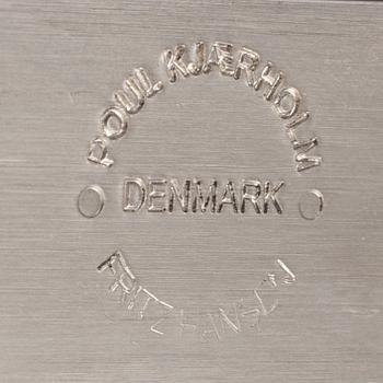 A Poul Kjaerholm PK61 glass table by Fritz Hansen.