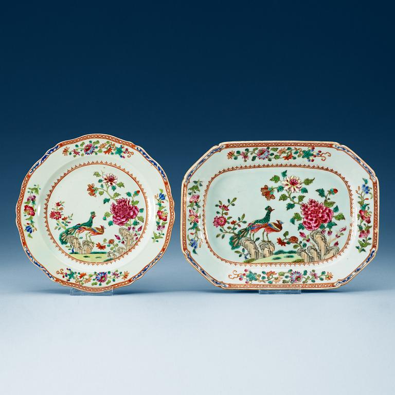 A famille rose 'double peacock' serving dish and a dinner plate. Qing dynasty, Qianlong (1736-95).