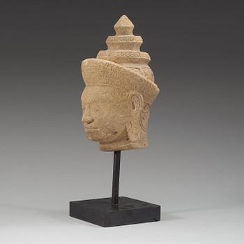 A Khmer stone head, presumably 13th Century.