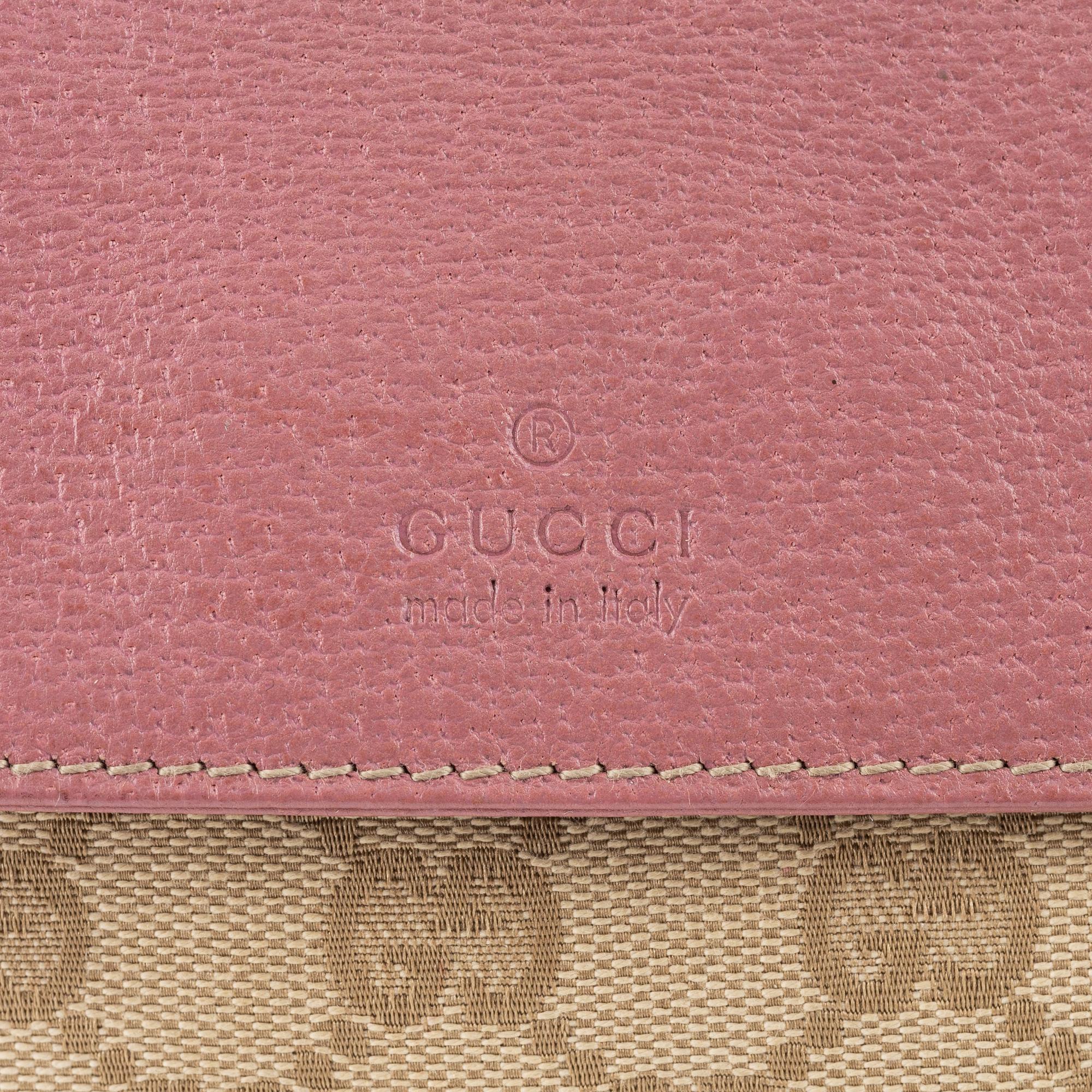 Gucci, a canvas beltbag.