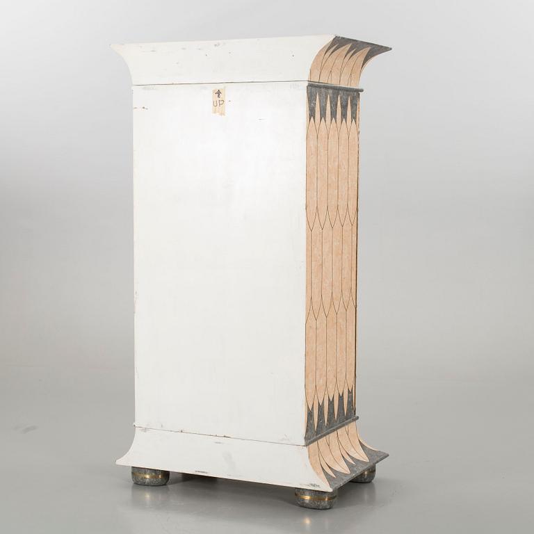 A Maitland & Smith cupboard.