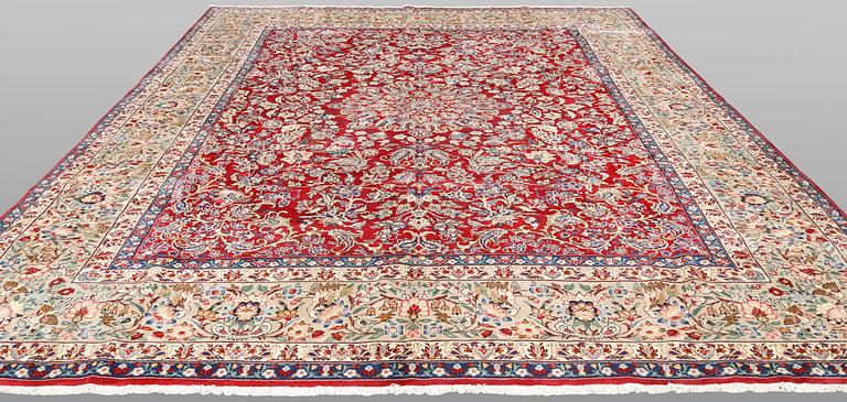 A carpet Yazd, c. 394 x 299 cm.