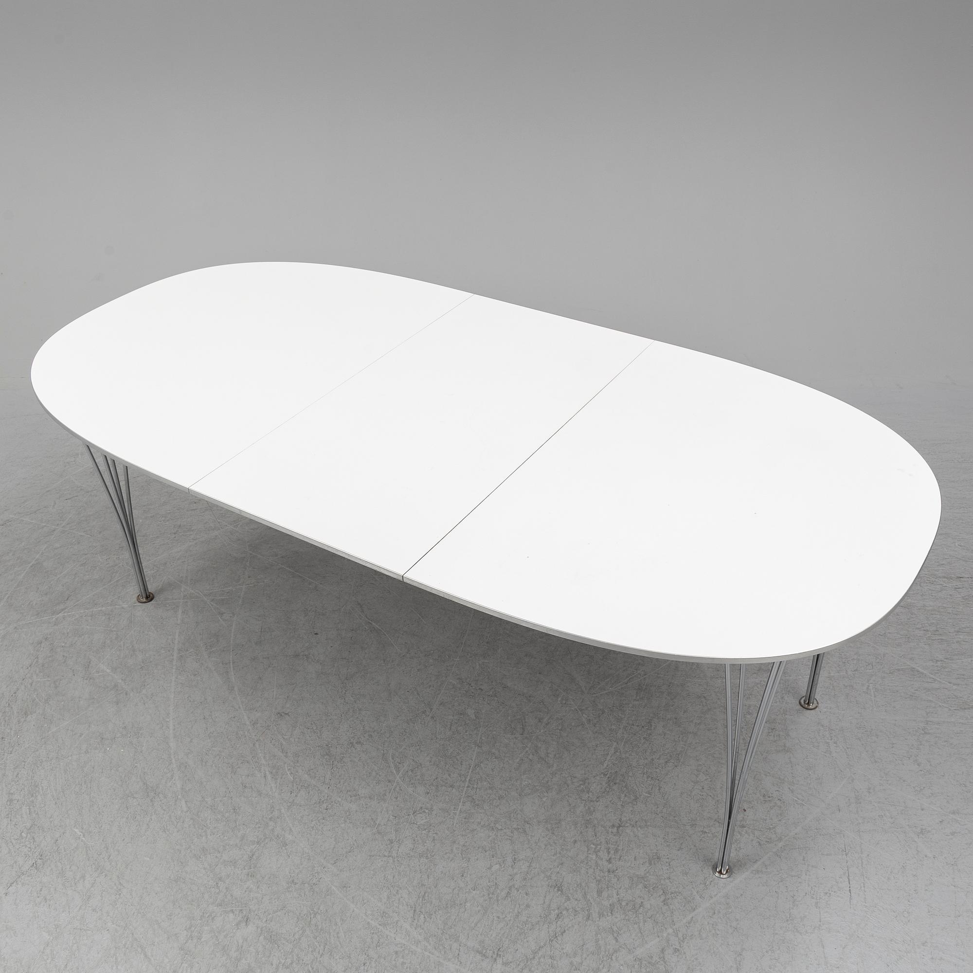 PIET HEIN & BRUNO MATHSSON, a 'Superellips' dining table, Fritz Hansen, Denmark.