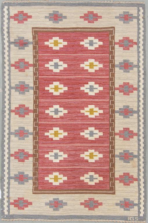 A sewdish flat weave carpet by Anna Greta Sjöquist, sigend AGS. Around 225 x 149 cm.