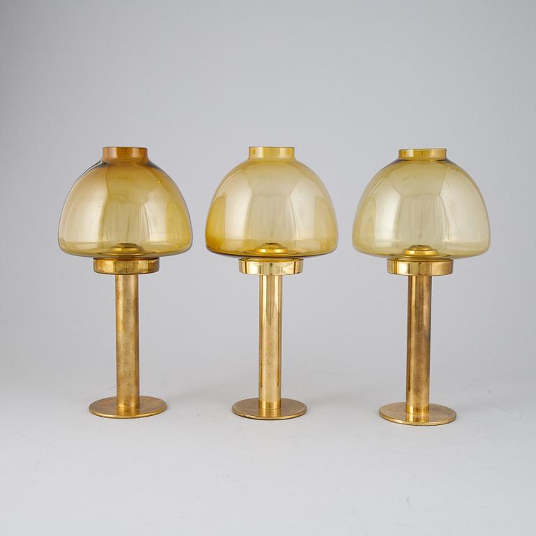 Hans-Agne Jakobsson, a set of three 'L102/32' brass and glass light holders, Markaryd.