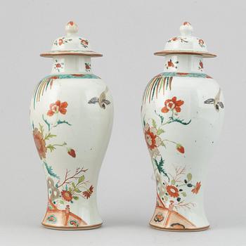 A pair of famille rose vases with covers, Qing dynasty, Qianlong (1736-95).