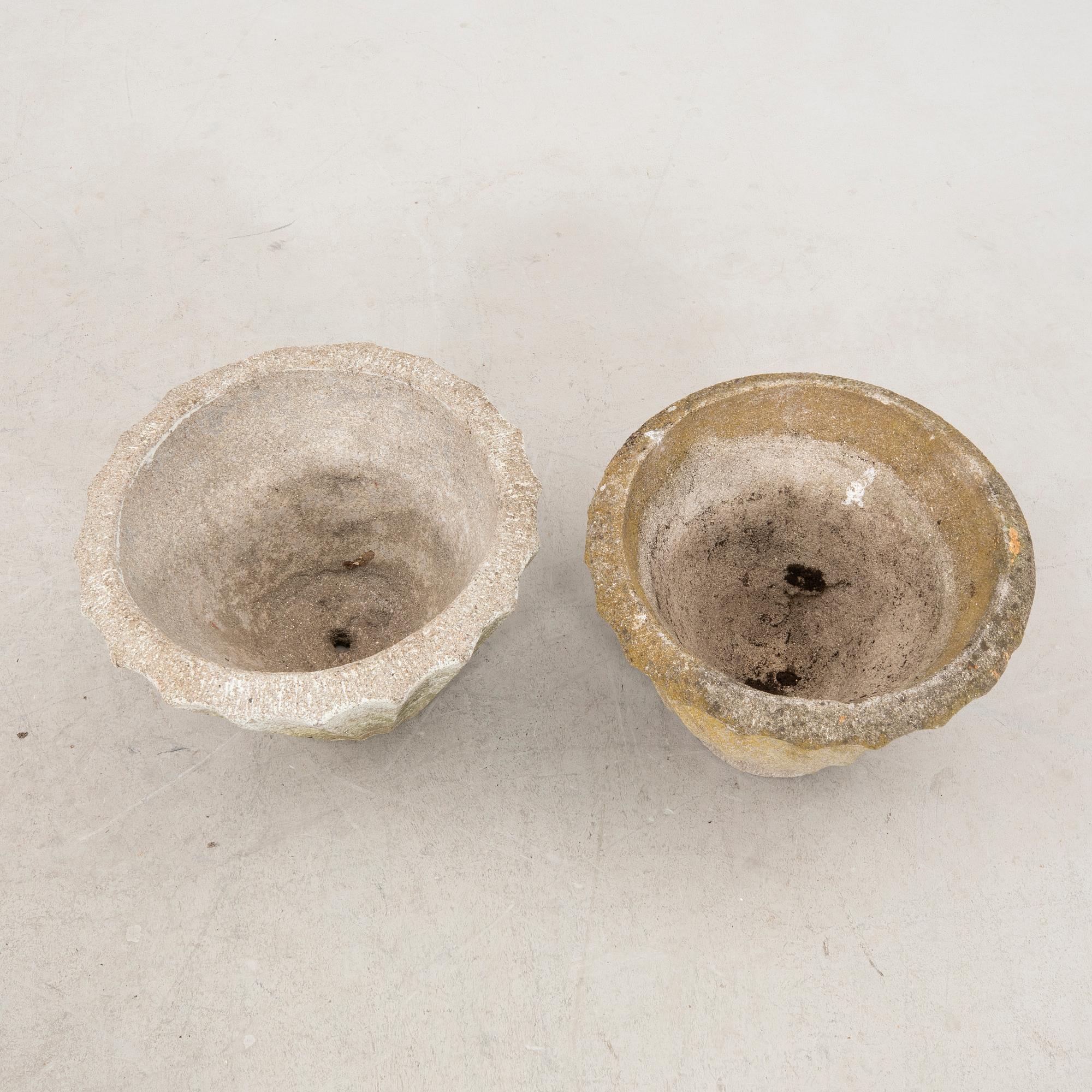 A pair of concrete garden pots middle of the 20th century.