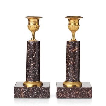 A pair of Swedish Empire candlesticks, early 19th century.