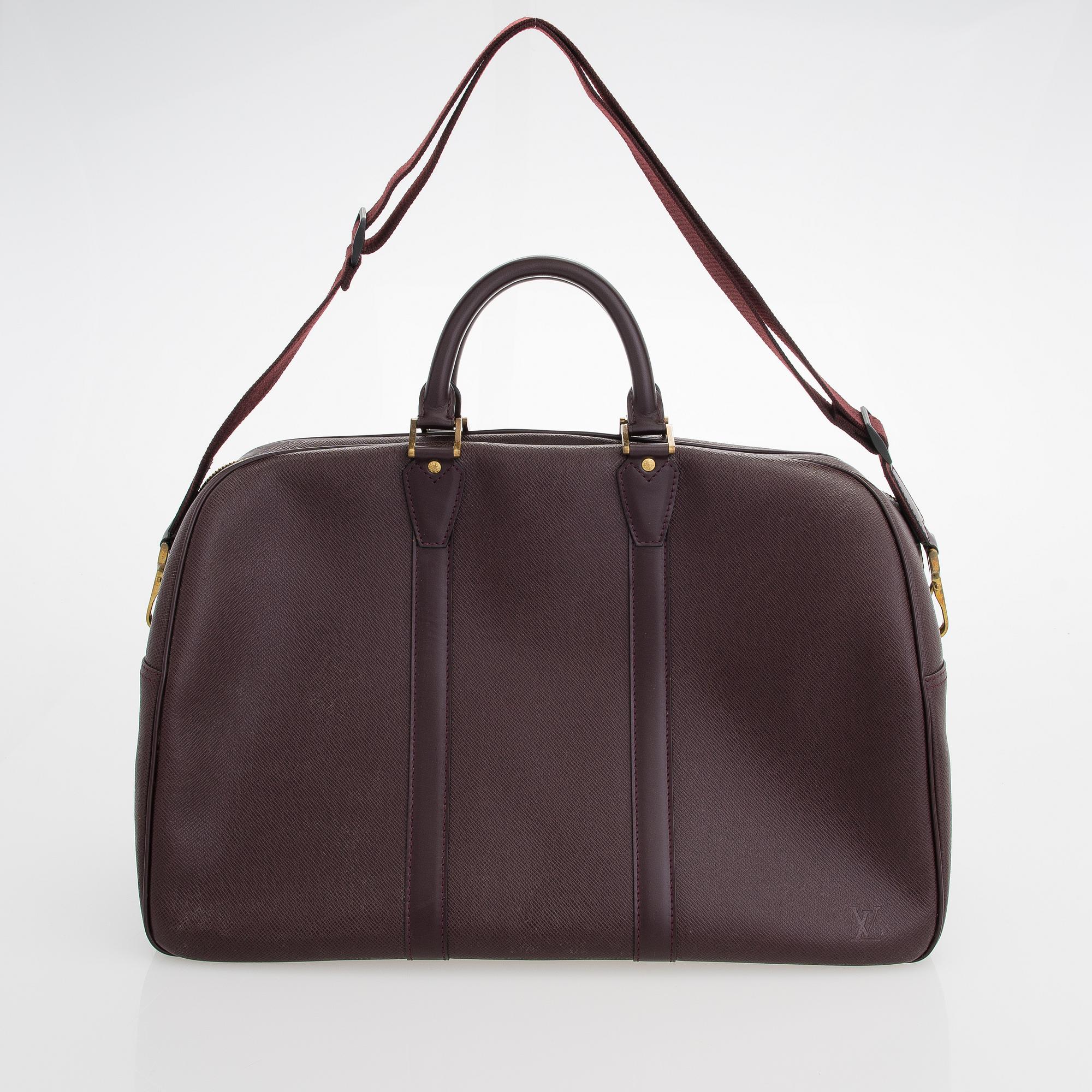 Louis Vuitton, 'Taiga Kendall PM' Bag.