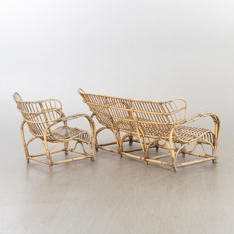 A sofa and a easy chair mid 20th century possibly by Viggo Boesen, Denmark.