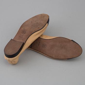 Ballerina shoes by Chanel.