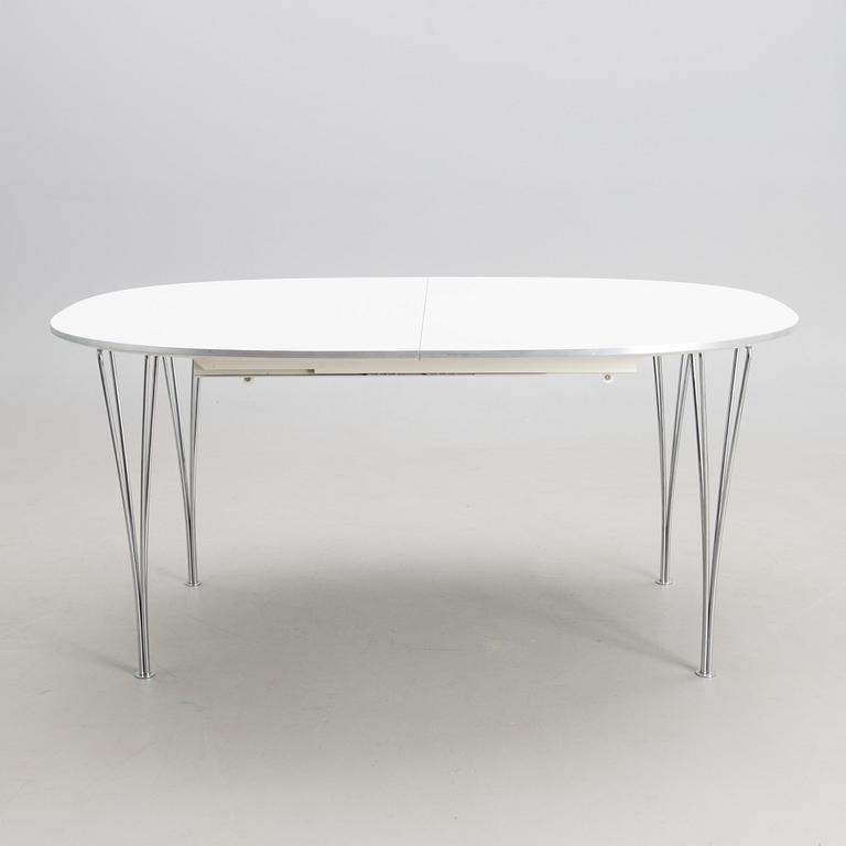 BRUNO MATHSSON AND PIET HEIN, a 'Superellips' dining table from Fritz Hansen, 1993.