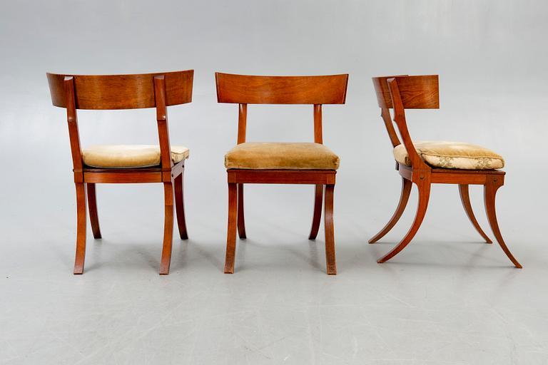A set of four mahogany chairs around 1900.