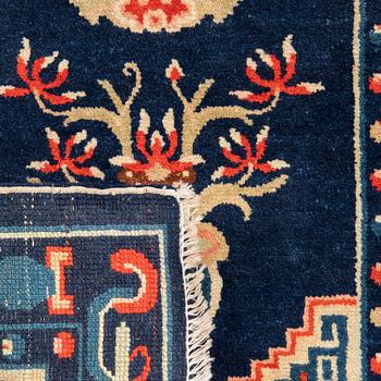 A semiantique Chinese Baotou carpet approx 106x58 cm.