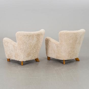 FRITZ HANSEN, a pair of easy cahir , model "1669".