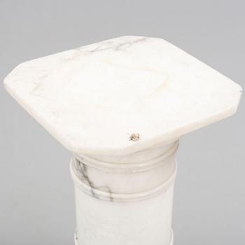 A marble pedestal, early 20th Century.