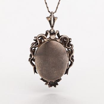 A necklace and a pair of earrings made of silver with enamel and marcasites. Paris, turn of the 20th century.