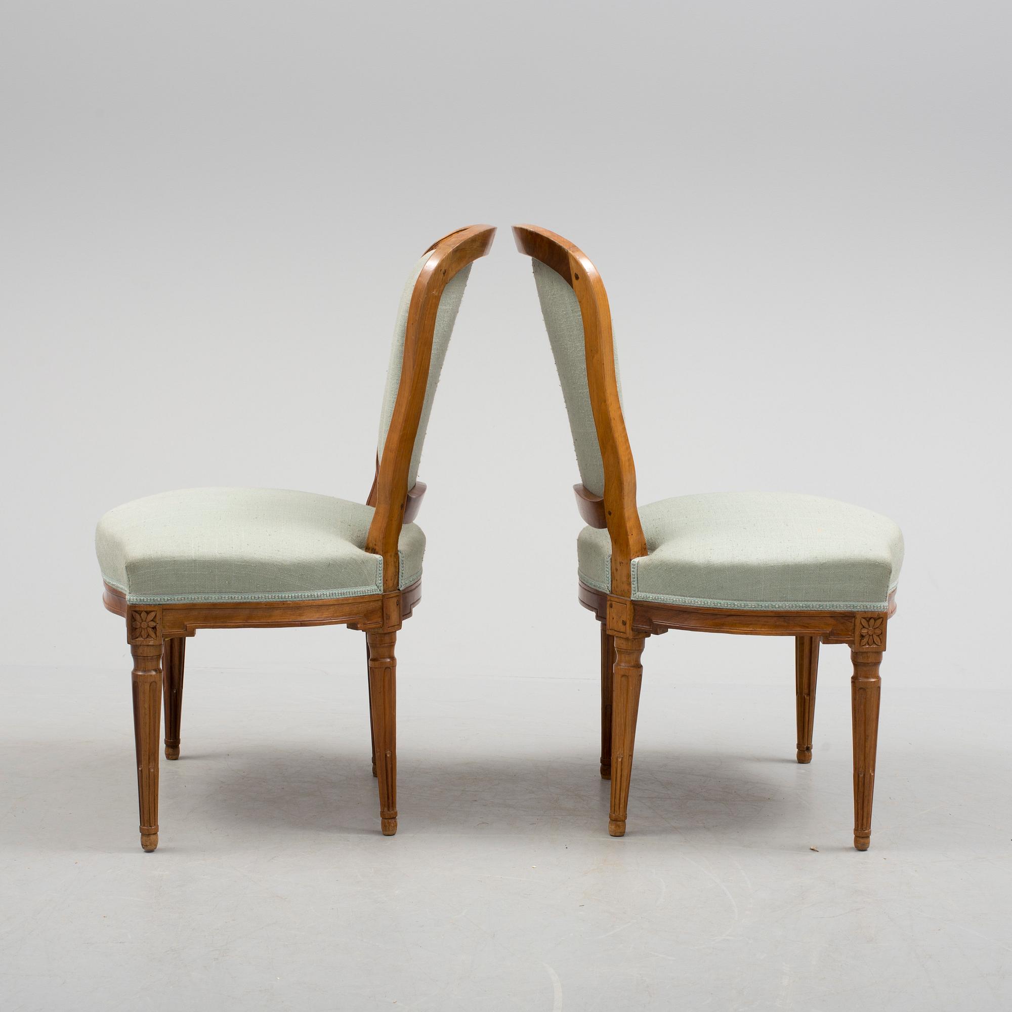 A pair of chairs, circa 1800.