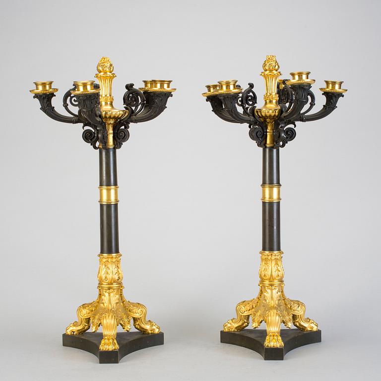 A pair of late Empire five-light candelabra in bronze from the middle of the 19h Century.