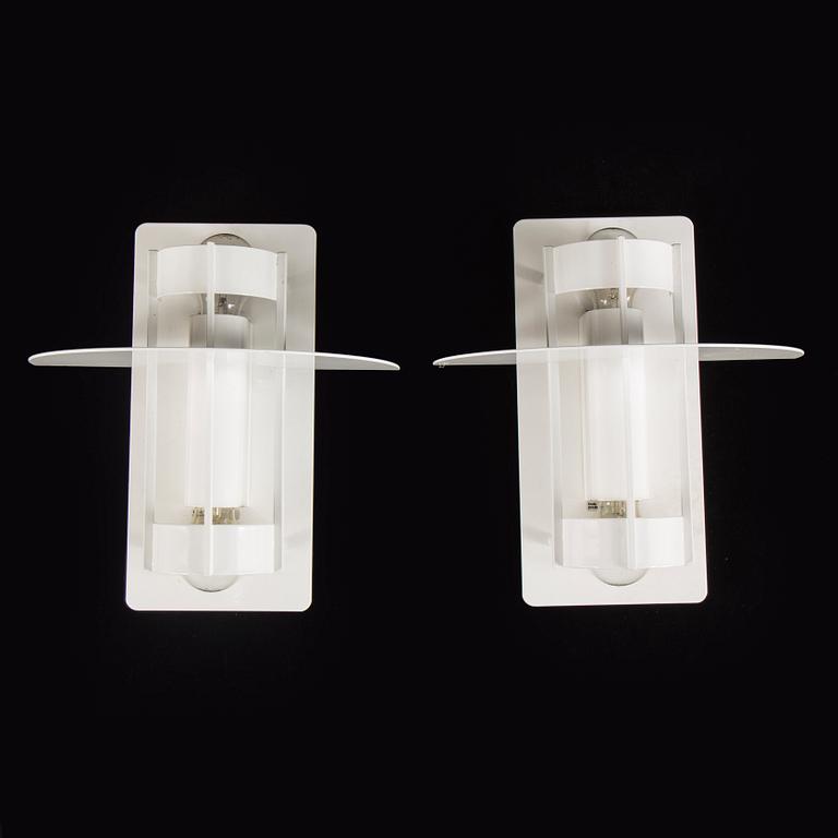 A set of two wall lamps by Joachim Lepper for Louis Poulsen, Danmark.