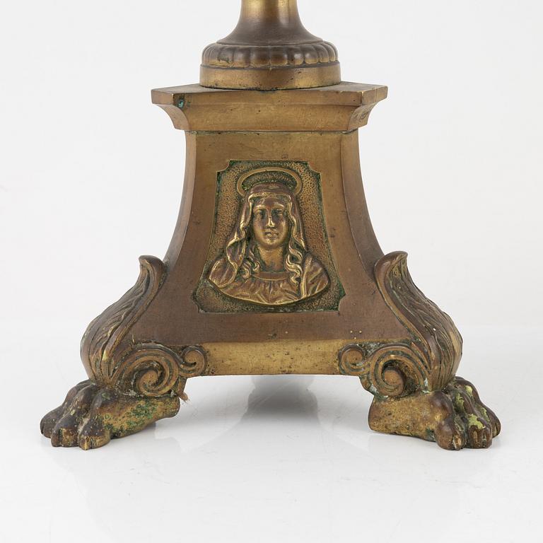 A pair of Baroque style brass altar candleholders, circa 1900.