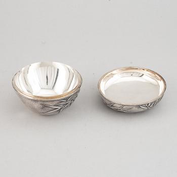 A group of four Japanese silver objects, mostly sterling, signed Yamakawa, Shokai Yokohama and Miyamoto, 20th century.