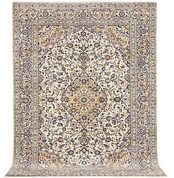 A Kashan rug, a. 250 x 242 cm.