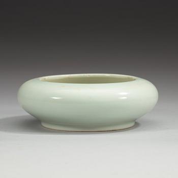 A pale celadon glazed brush washer, Qing dynasty (1644-1912), with Kangxi six character mark.