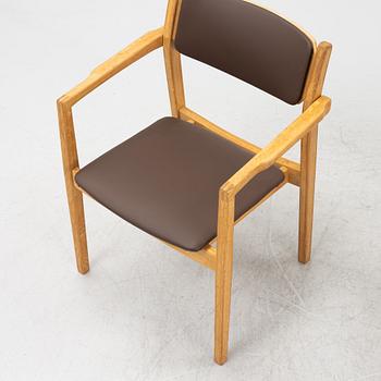 A set of six oak armchairs by C-E Ekström form Albin i Hyssna, 1960s.