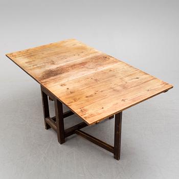 A end of the 19th century pine gate leg table.