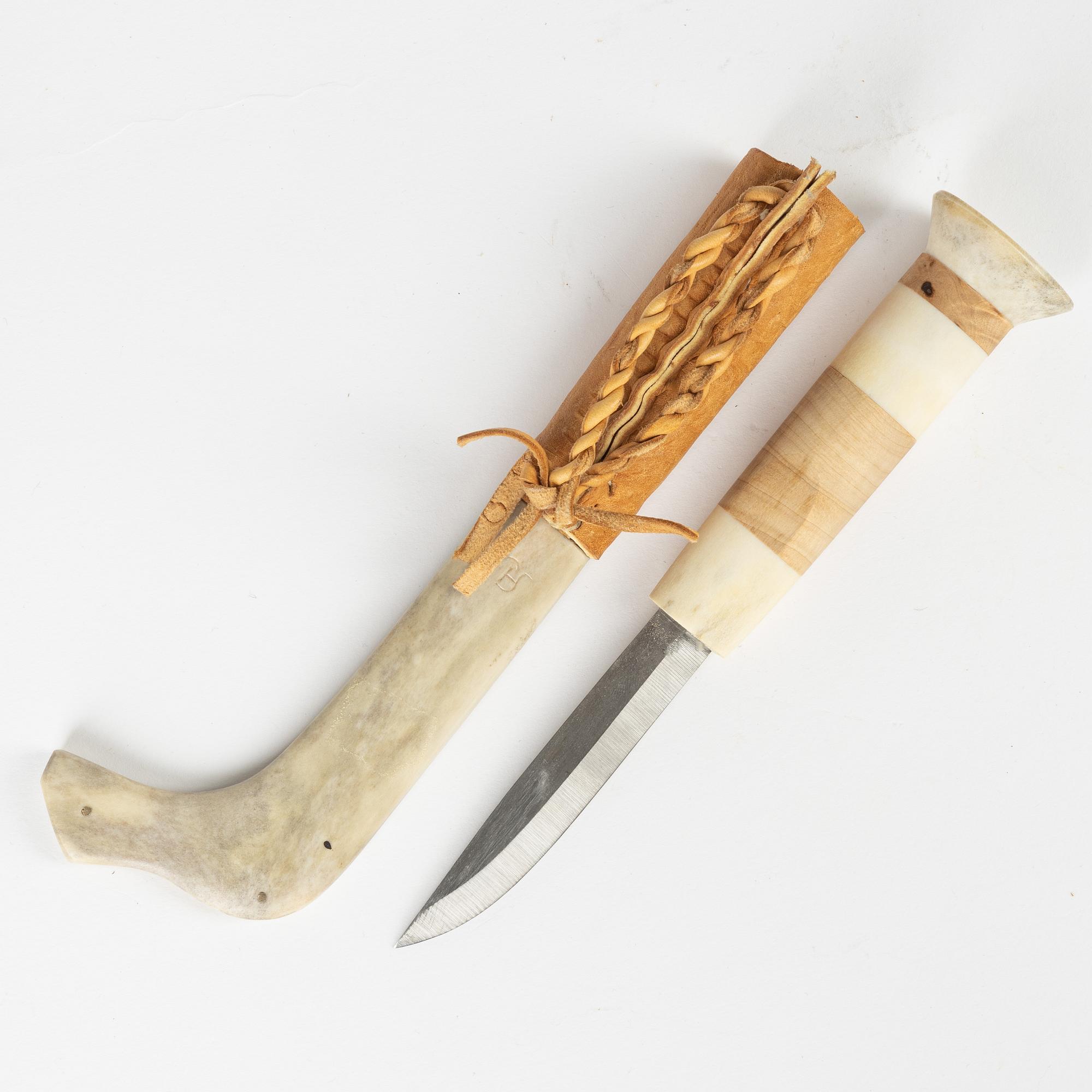 A reindeer horn knife by Per Henrik Simma, signed.