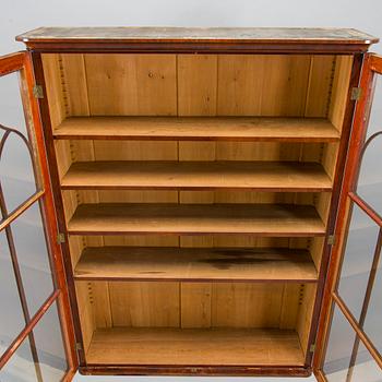 A 1830s/40s mahogany book case cabinet.