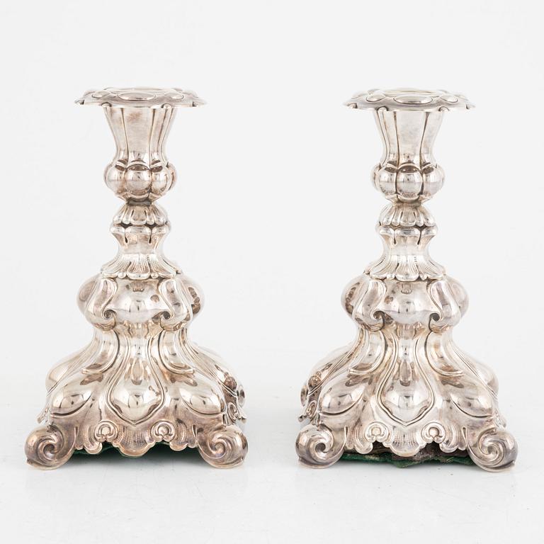 A pair of silver candlesticks and a bowl, including GAB, Stockholm 1933.