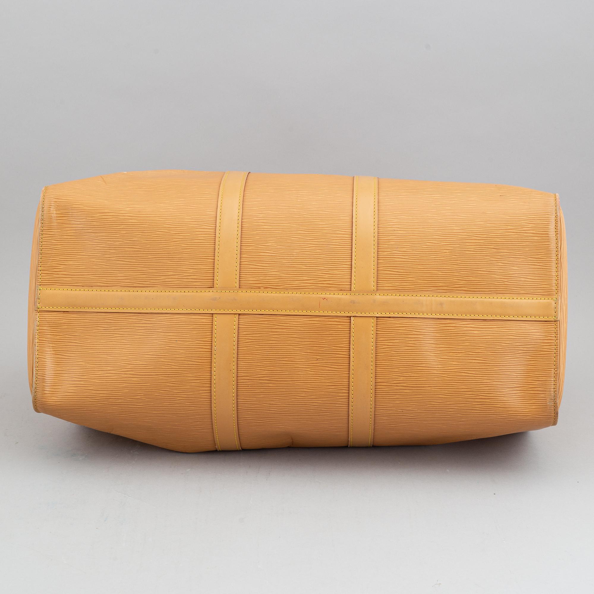 Louis Vuitton, am Epi 'Keepall 50' weekend bag.