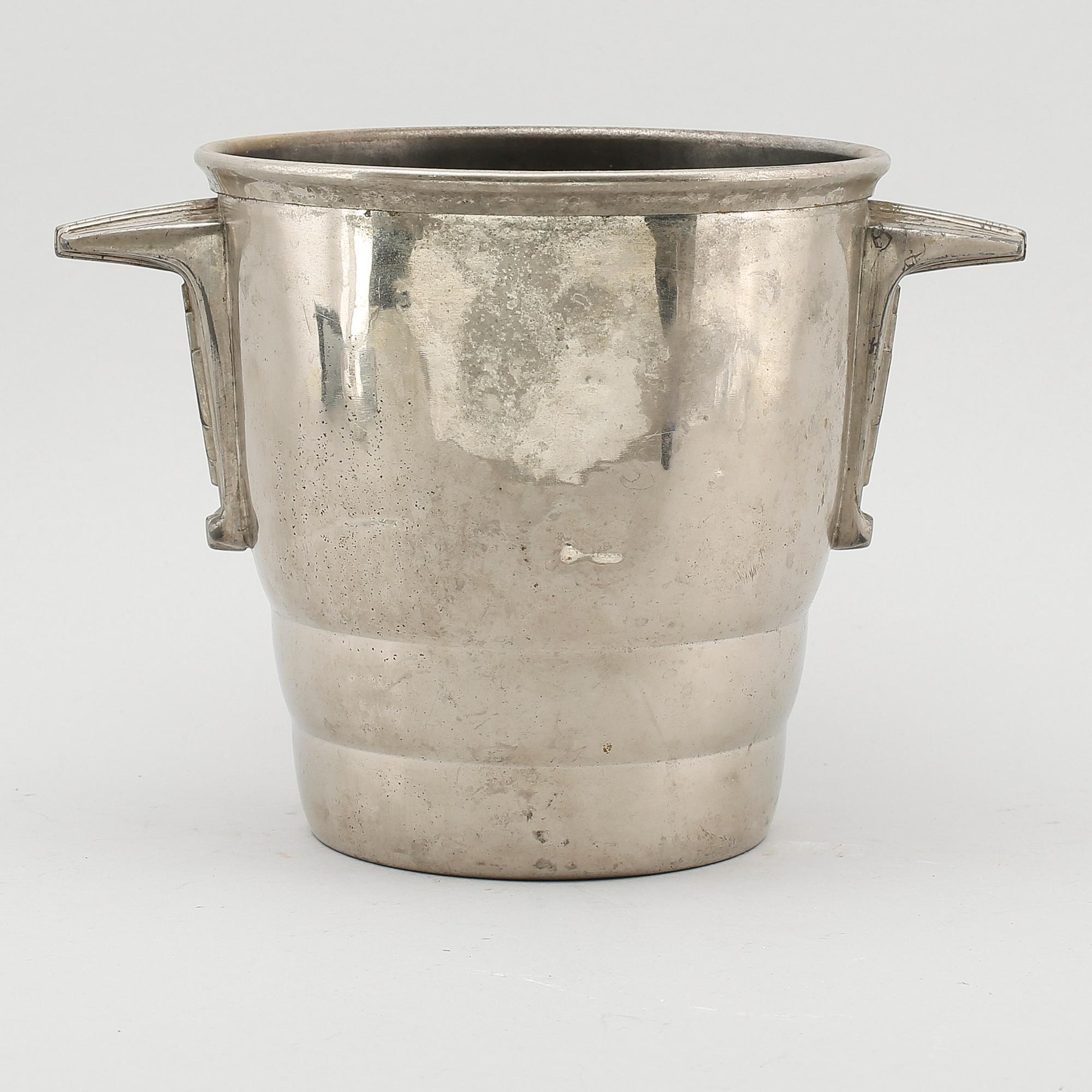 CHAMPAGNEKYLARE, försilvrad mässing, 1900-talets första hälft.