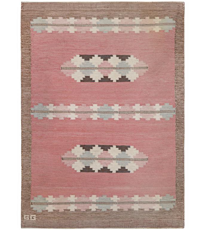 A flat weave carpet, signed GG, c. 190 x 133 cm.