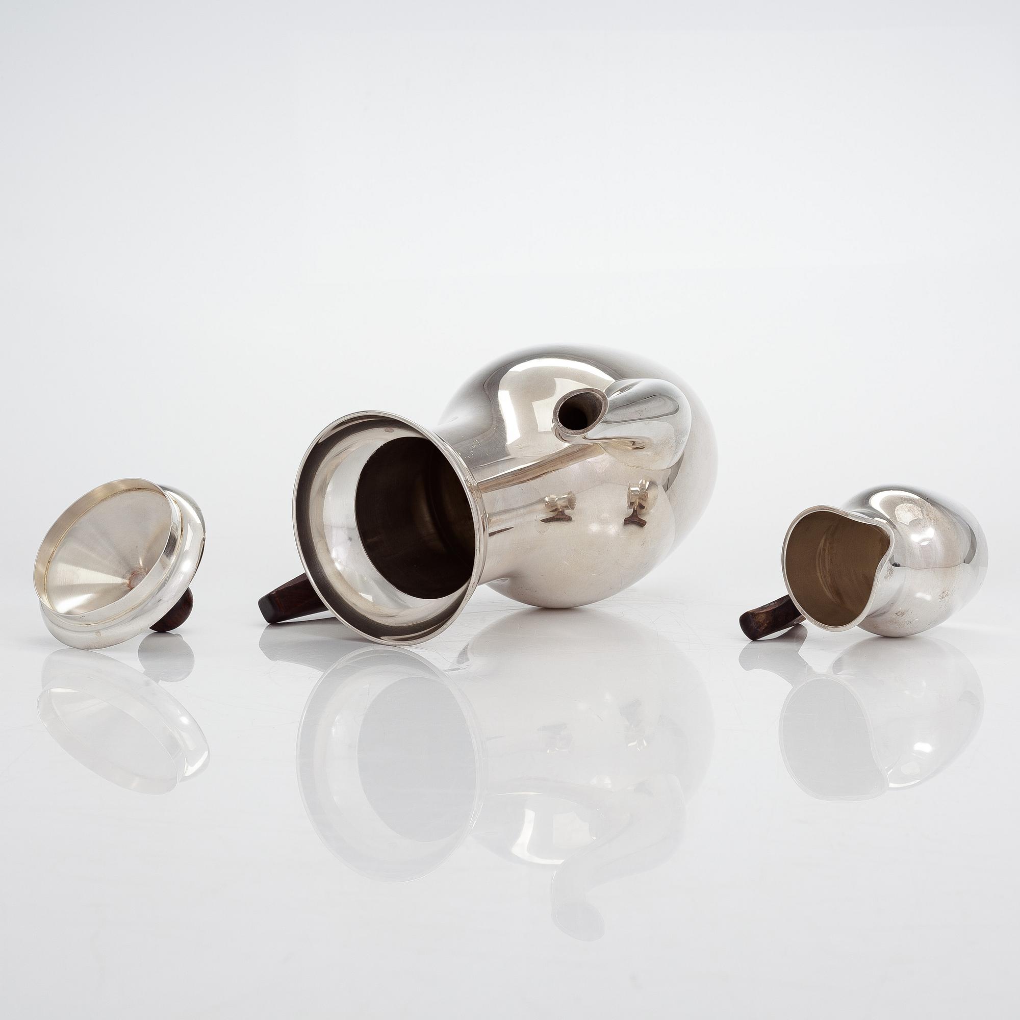 Tapio Wirkkala, a three-piece sterling silver and rosewood coffee set with tray, Kultakeskus, Hämeenlinna  1959-1971.