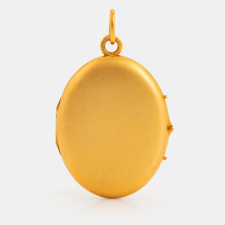 A 14K gold locket.