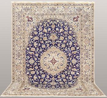 A carpet, Nain part silk, ca 353 x 253 cm.