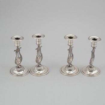 A Swedish 19th century matched set of four silver candlesticks, mark of Johan Petter Grönvall, Stockholm 1824.