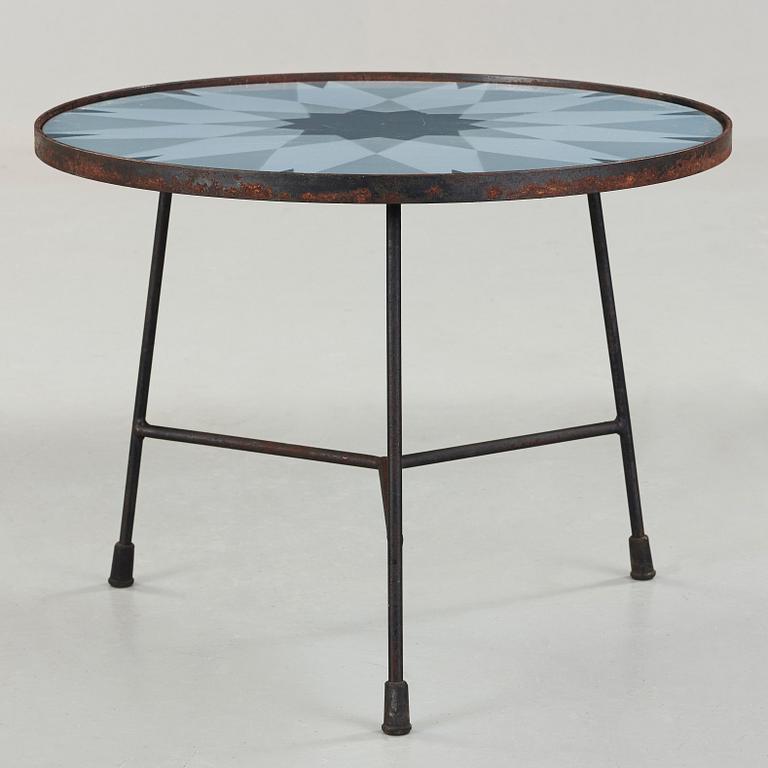 Kerstin Hörlin-Holmquist, an enamelled top table on an iron base, Nordiska Kompaniet, Sweden 1950's.