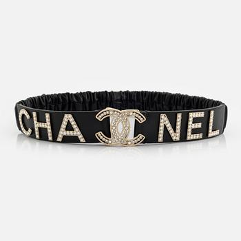 Chanel, a leather, metal and rhinestone belt.