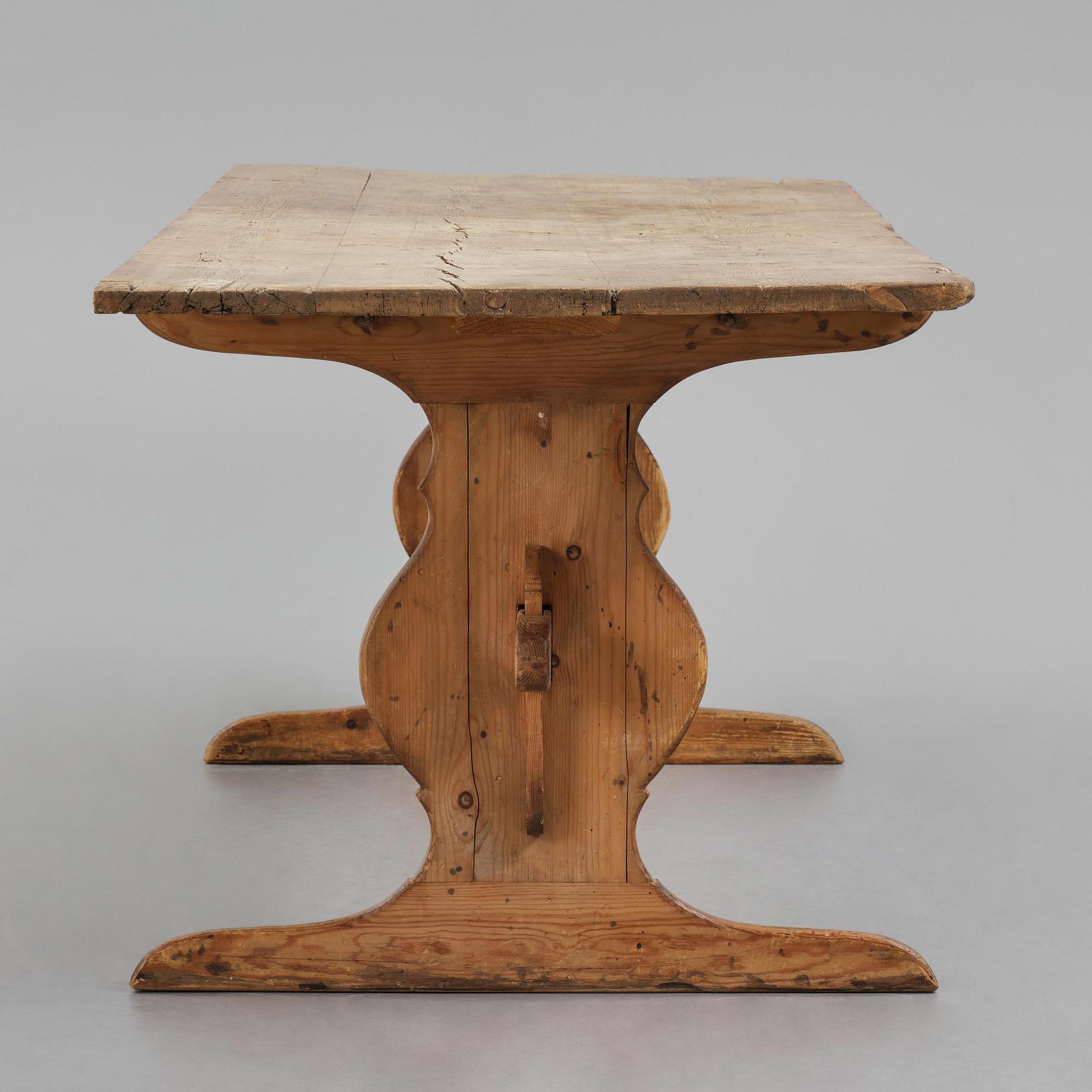 A pine trestle table, 20th century incorporating older elements.