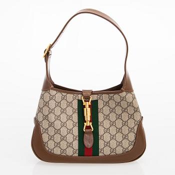 Gucci, a monogram 'Jackie' Bag.