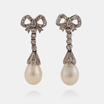 964. A pair of platinum and cultured pearl earrings set with eight-cut diamonds.